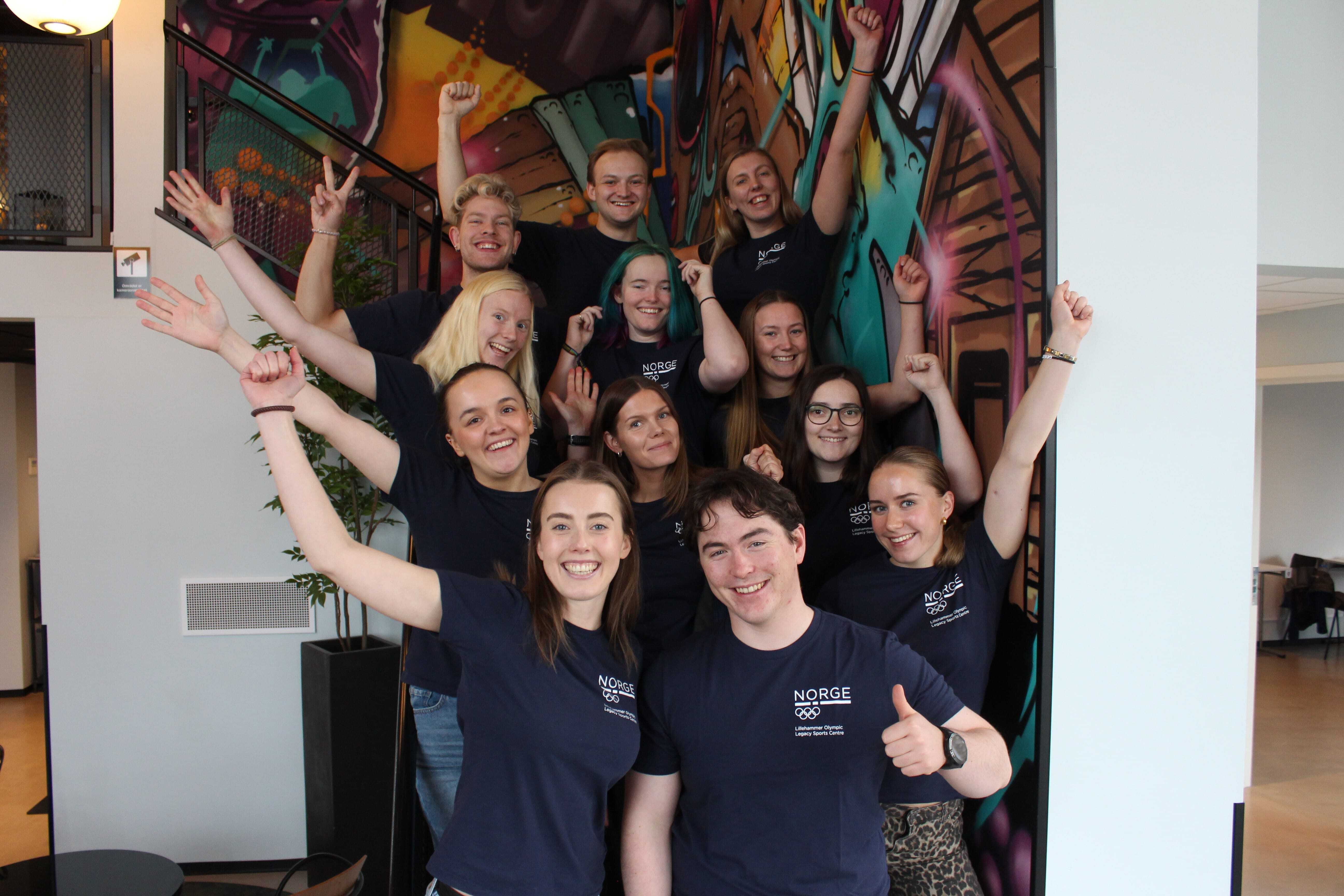 A happy group photo celebrating victory in the Climate Competition, featuring the team from Lillehammer Olympic Legacy Sports Centre